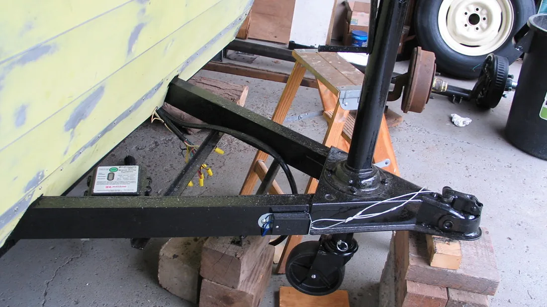 Close view of a caster wheel for a rolling stool or work cart